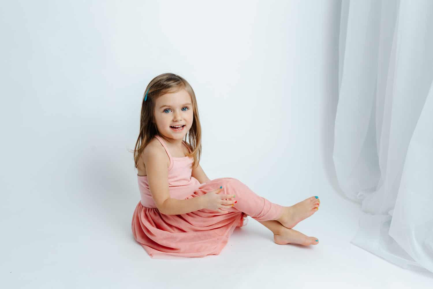 Guelph Early On Centers, little girl sitting for her photoshoot 